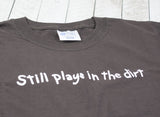 "Still Plays in the Dirt" Unisex T-Shirt